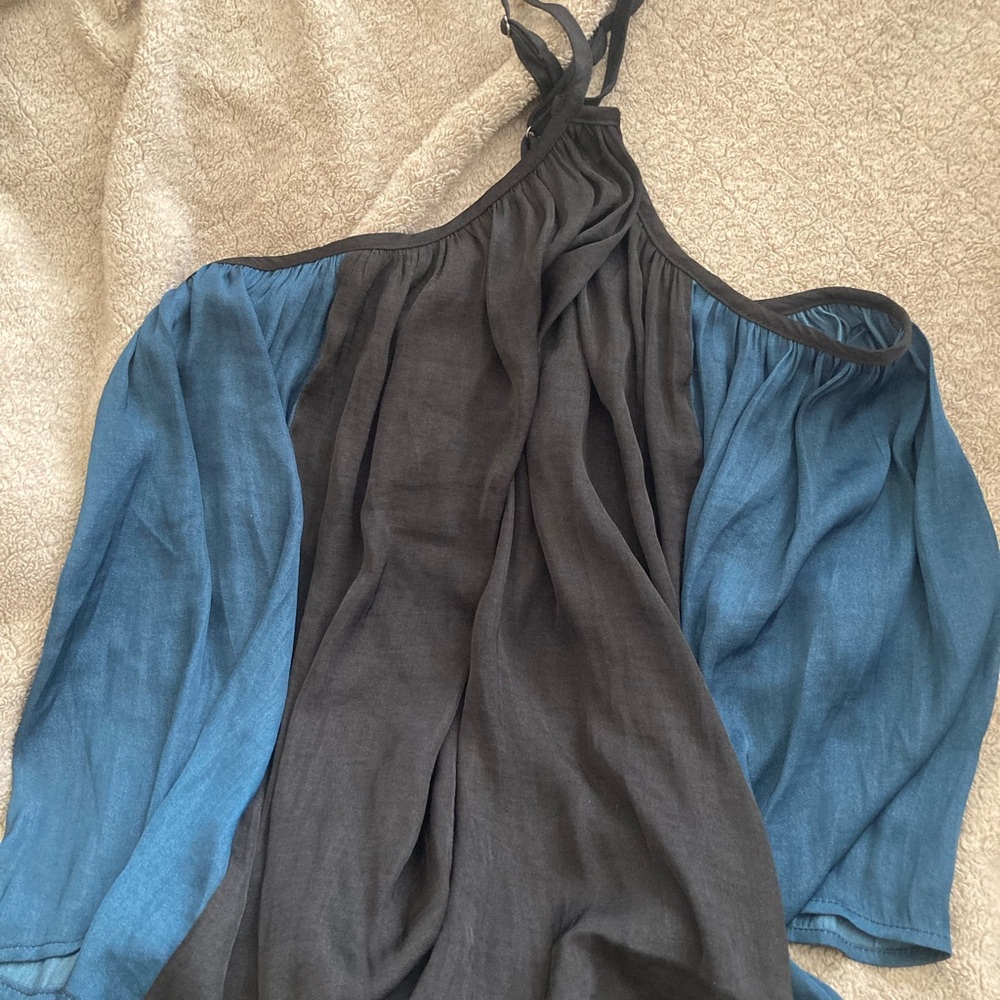 New with tags, two tone flowy top, silky feel. Adjustable straps, no flaws.